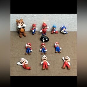 Lot of 12 Jakks Super Mario Figures: Ice, Tanooki, Propeller, Fire, Mario & More